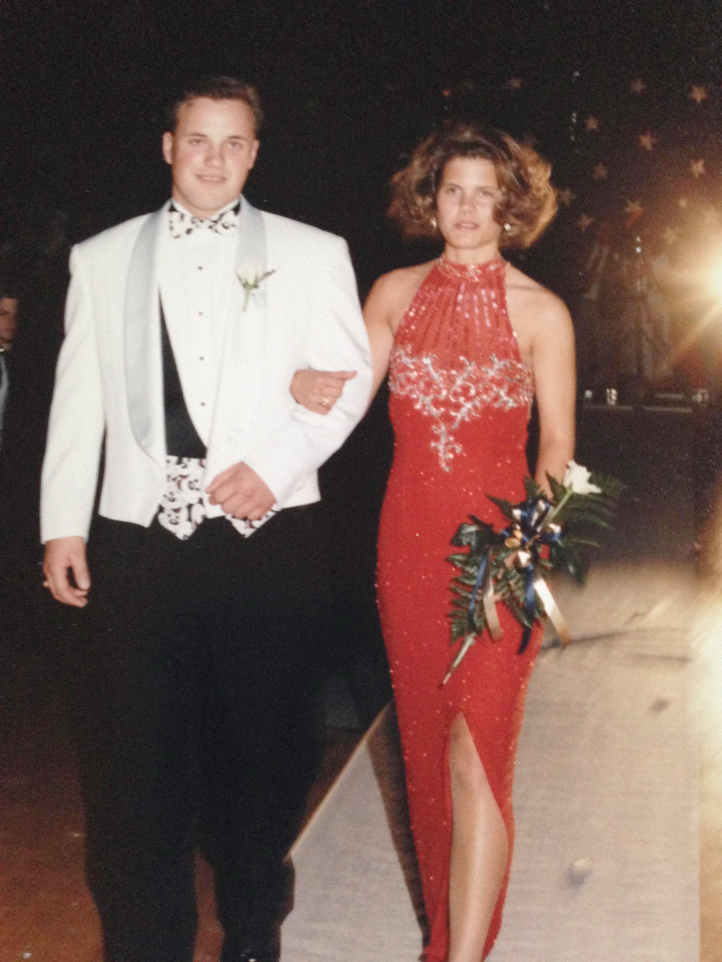 Jana Shortal as prom queen with a male prom goer on her arm